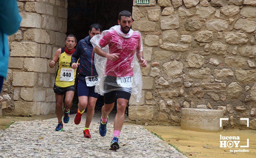 GALERÍA: Mounir Elouardi y Nazha Machrouh repiten reinado bajo el diluvio en la Media Maraton de Lucena