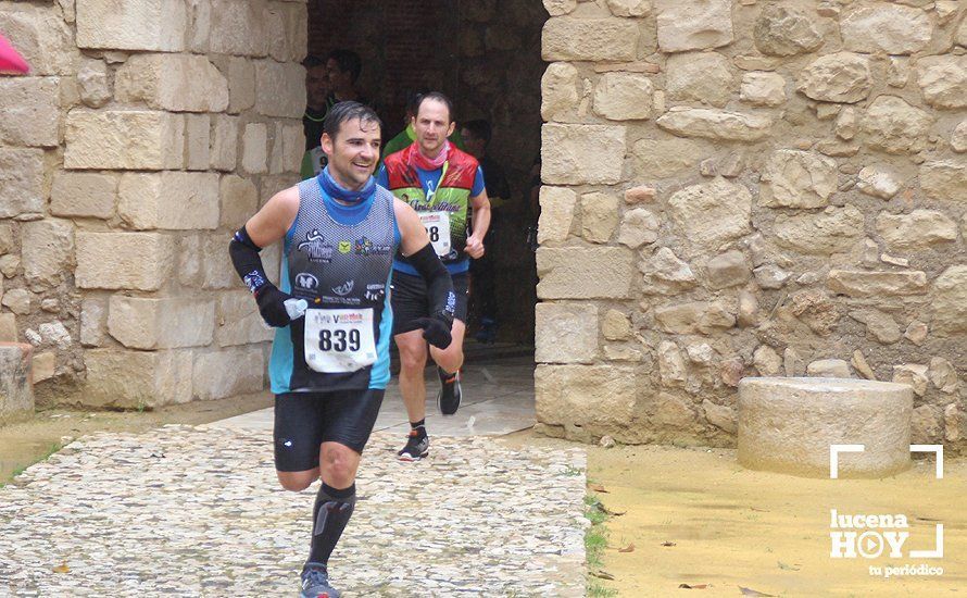 GALERÍA: Mounir Elouardi y Nazha Machrouh repiten reinado bajo el diluvio en la Media Maraton de Lucena