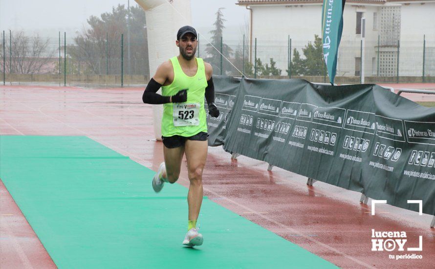 GALERÍA: Mounir Elouardi y Nazha Machrouh repiten reinado bajo el diluvio en la Media Maraton de Lucena