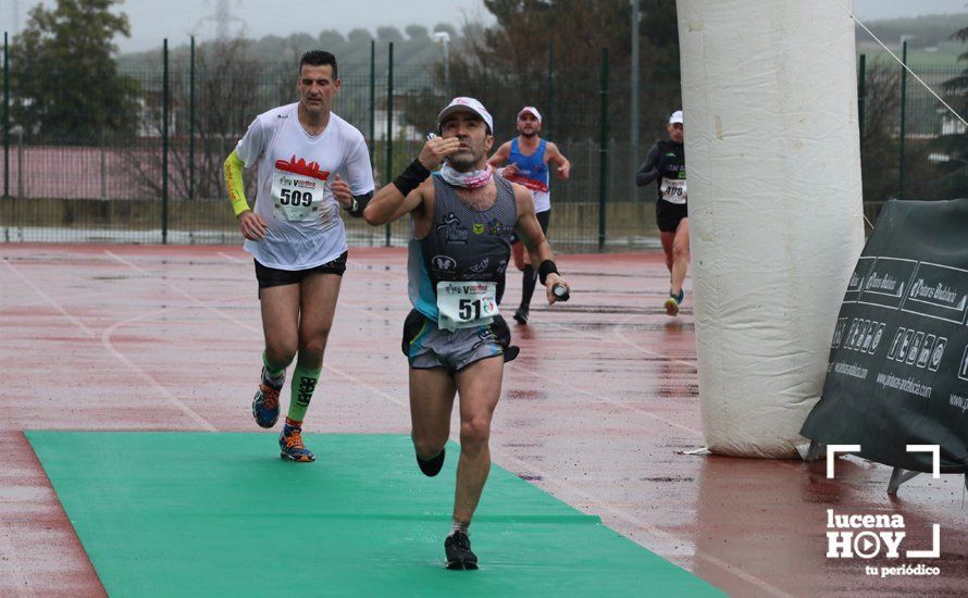 GALERÍA: Mounir Elouardi y Nazha Machrouh repiten reinado bajo el diluvio en la Media Maraton de Lucena