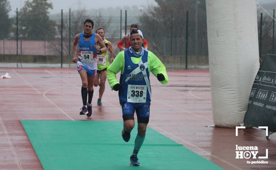 GALERÍA: Mounir Elouardi y Nazha Machrouh repiten reinado bajo el diluvio en la Media Maraton de Lucena