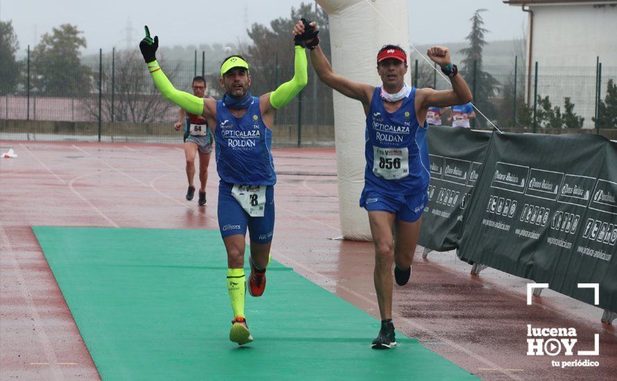 GALERÍA: Mounir Elouardi y Nazha Machrouh repiten reinado bajo el diluvio en la Media Maraton de Lucena