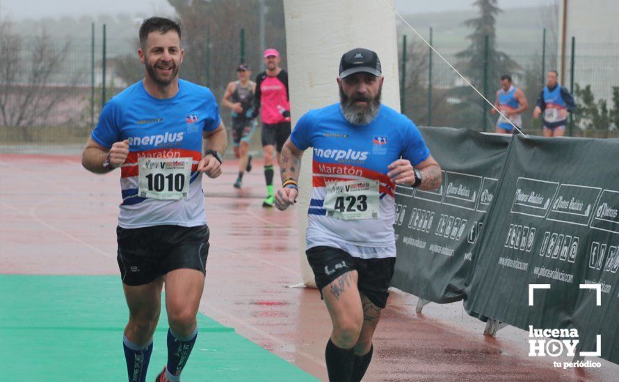 GALERÍA: Mounir Elouardi y Nazha Machrouh repiten reinado bajo el diluvio en la Media Maraton de Lucena