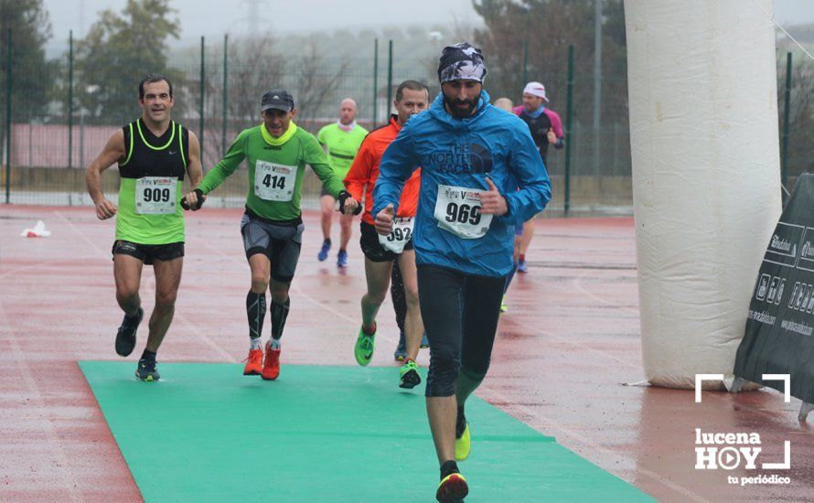 GALERÍA: Mounir Elouardi y Nazha Machrouh repiten reinado bajo el diluvio en la Media Maraton de Lucena