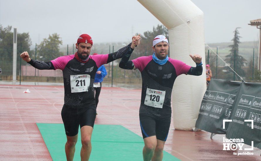 GALERÍA: Mounir Elouardi y Nazha Machrouh repiten reinado bajo el diluvio en la Media Maraton de Lucena