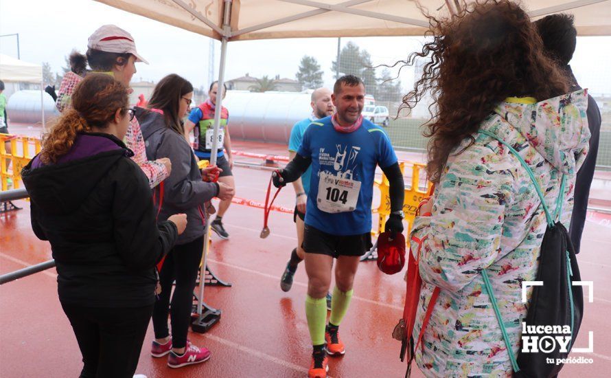 GALERÍA: Mounir Elouardi y Nazha Machrouh repiten reinado bajo el diluvio en la Media Maraton de Lucena