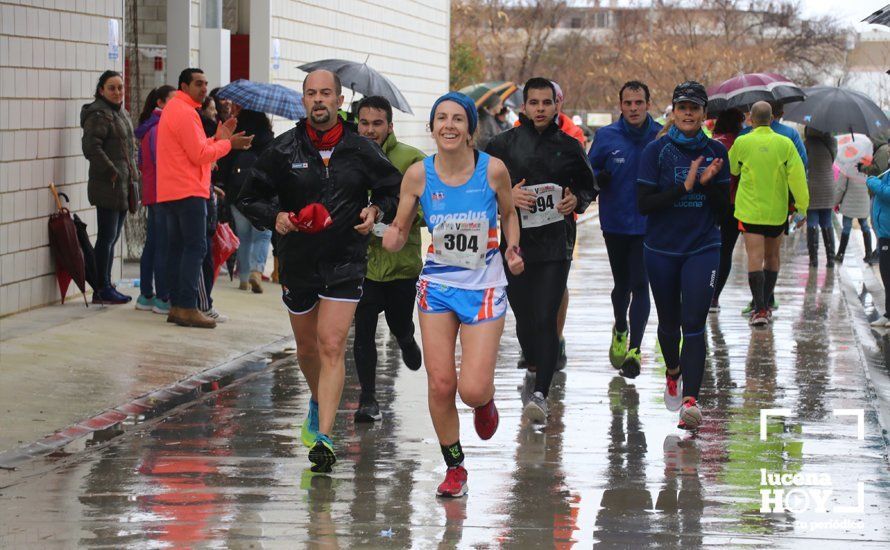 GALERÍA: Mounir Elouardi y Nazha Machrouh repiten reinado bajo el diluvio en la Media Maraton de Lucena