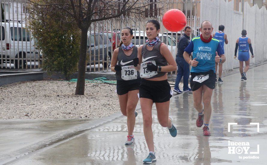 GALERÍA: Mounir Elouardi y Nazha Machrouh repiten reinado bajo el diluvio en la Media Maraton de Lucena