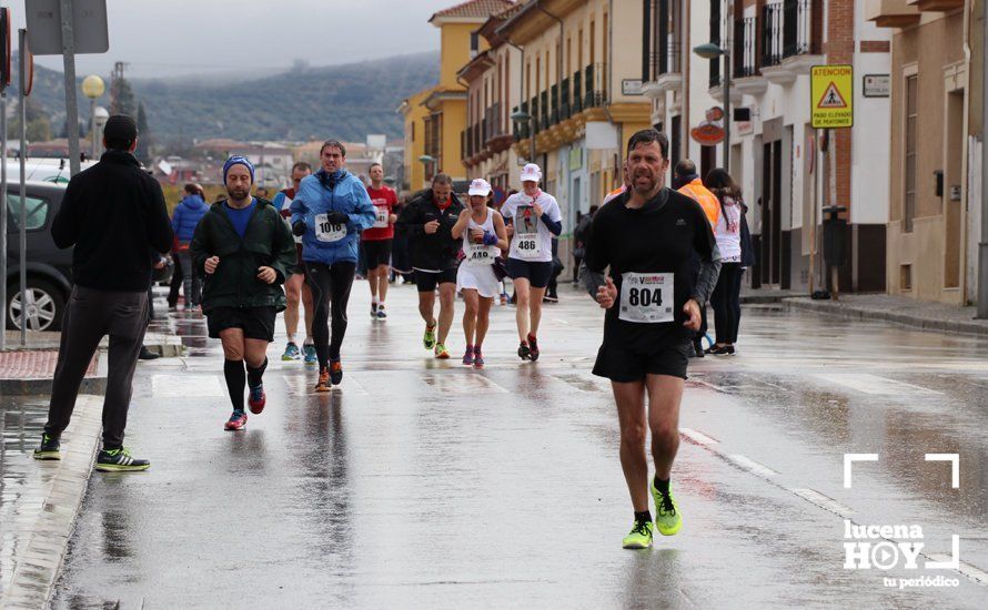 GALERÍA: Mounir Elouardi y Nazha Machrouh repiten reinado bajo el diluvio en la Media Maraton de Lucena