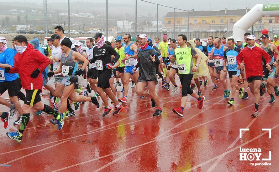 GALERÍA: Mounir Elouardi y Nazha Machrouh repiten reinado bajo el diluvio en la Media Maraton de Lucena