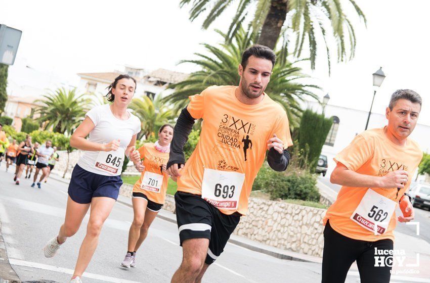 GALERÍA I: XXI Carrera Popular Ciudad de Lucena: Todo el mundo a correr: La salida y el recorrido urbano