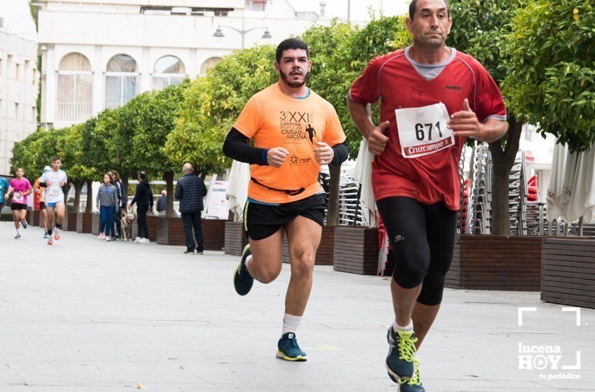 GALERÍA I: XXI Carrera Popular Ciudad de Lucena: Todo el mundo a correr: La salida y el recorrido urbano