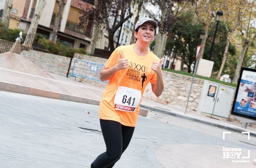 GALERÍA I: XXI Carrera Popular Ciudad de Lucena: Todo el mundo a correr: La salida y el recorrido urbano