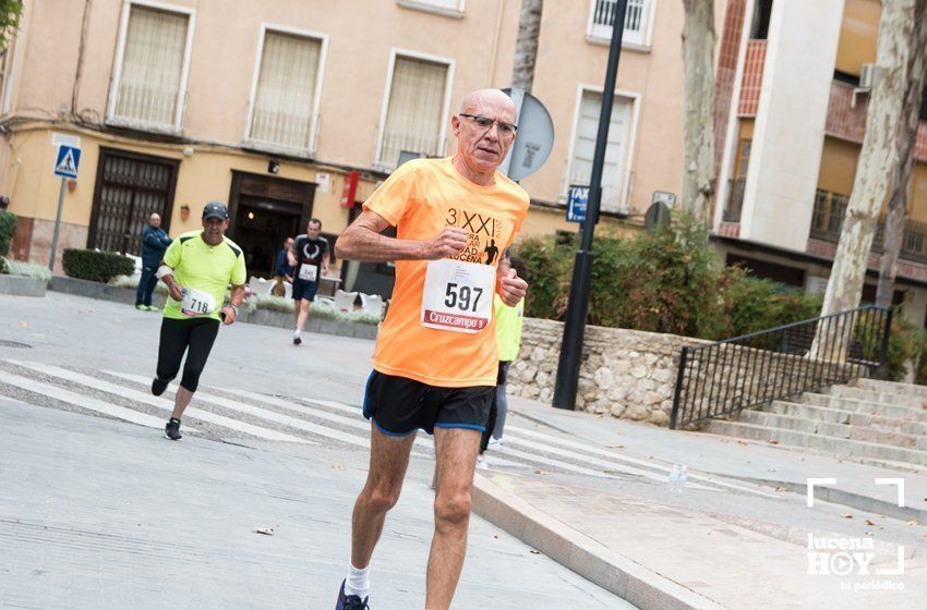 GALERÍA I: XXI Carrera Popular Ciudad de Lucena: Todo el mundo a correr: La salida y el recorrido urbano