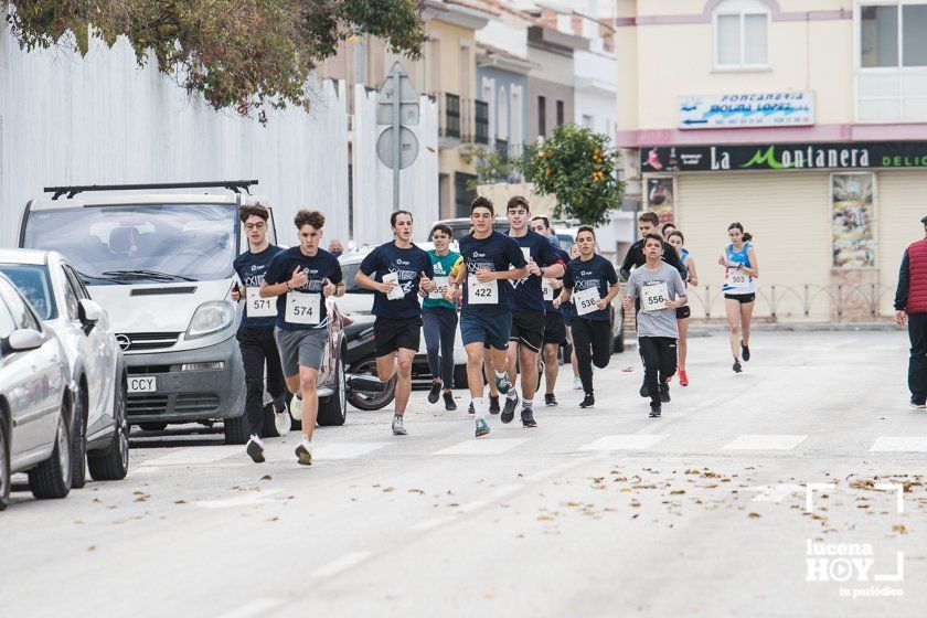 GALERÍA III: XXII Carrera Popular Ciudad de Lucena: Las fotos de la carrera cadete y juvenil y la reservada a personas con discapacidad