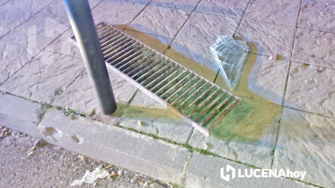 Imbornal utilizado para golpear el escaparate de Deportes Alcalá Imbornal utilizado para golpear el escaparate de Deportes Alcalá